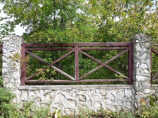 Fragment of the compound fence of the monastery's possessions