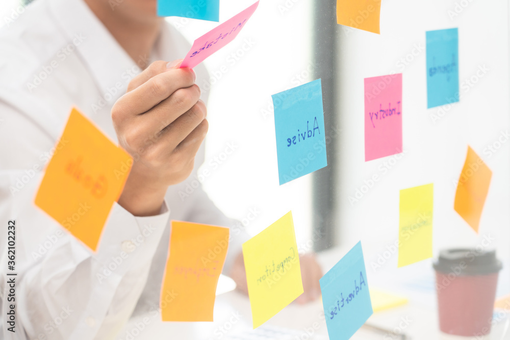 Poster business team planning startup project placing sticky notes session to share idea or brainstorm