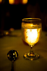 A bright glass and spoon in restaurant