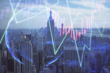 Forex graph on city view with skyscrapers background double exposure. Financial analysis concept.