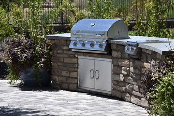 Outdoor gas grill BBQ with flagstone