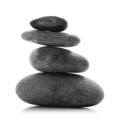 Spa stones on white background
