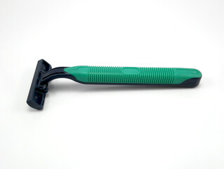 Disposable plastic green and black body manual shaver