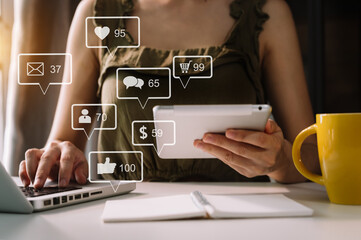 Social media and Marketing virtual icons screen concept.close up of businesswoman typing keyboard...
