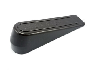 Black hard inclined plastic door stopper with ridges