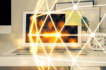 Computer on desktop with social network theme icon. Multi exposure. Concept of international connections.