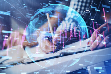 Multi exposure of two men planing investment with stock market forex chart.