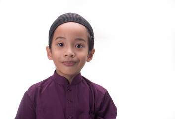 A Muslim kid with various poses isolated over white