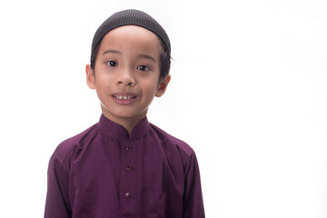A Muslim kid with various poses isolated over white
