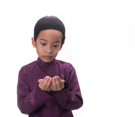 A Muslim kid with various poses isolated over white