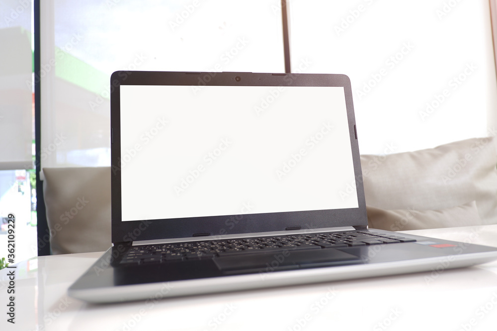 Fototapete Cropped shot view of the labtop with blank copy space screen for your information content or text message.