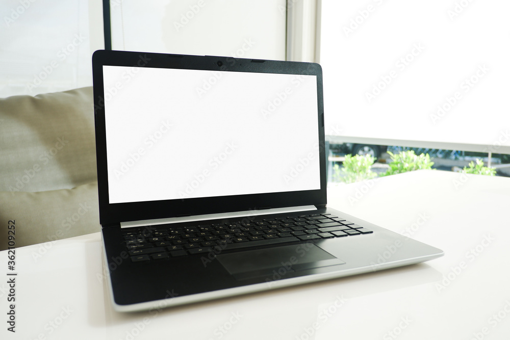 Poster cropped shot view of the labtop with blank copy space screen for your information content or text me