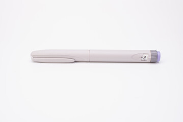 Insulin pen isolated over white