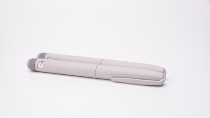 Insulin pen isolated over white