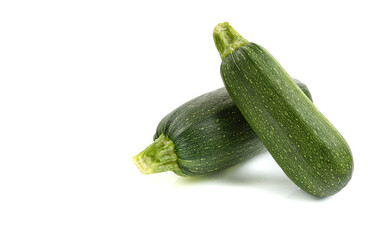 two green zucchini on a white background close-up,