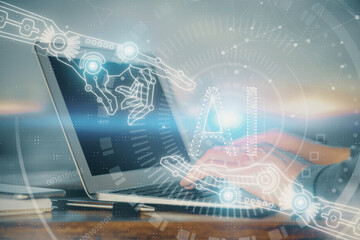 Naklejka premium A man working on Laptop with technology theme drawing. Concept of big data. Double exposure.