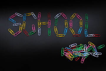 School composed of multi-colored paper clips. 1 september is the day of knowledge. Happy teacher day. School holiday
