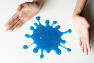 Hand Holding Dark Blue Slime, Homemade Toy Make You Feel Stretching and Mucilage When Playing.  Kids having fun and being creative by science experiment.