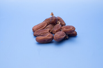 Dry dates over blue background
