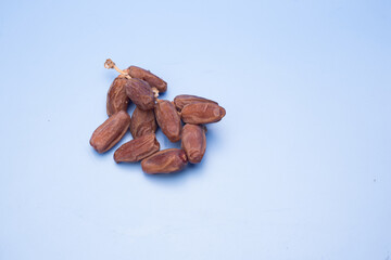 Dry dates over blue background