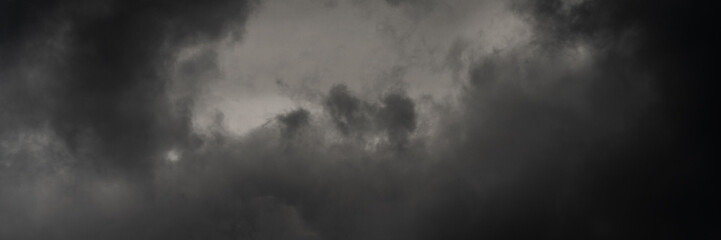 Panorama dramatic storm clouds in dusk sky, rainy and overcast weather. Natural meteorology...