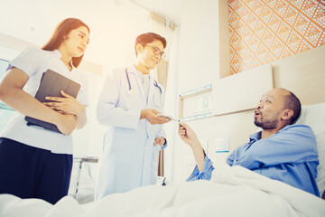Doctor  having health problem of patient at hospital,medicine, doctor, healthcare and people concept