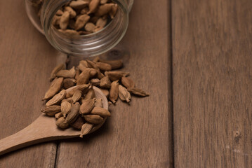Cardamom herbs,over wooden background