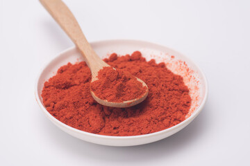 Chili powder isolated over grey background