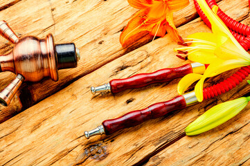 Smoking hookah with flower tobacco