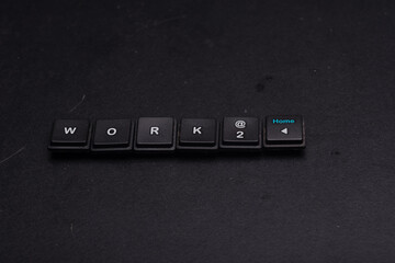 Work at home message isolated over dark blackground