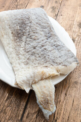 Slice of raw salted codfish