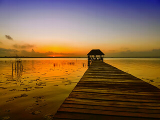 Obraz na płótnie Canvas Sunrise on Lake Bacalar, Quintana Roo, Mexico