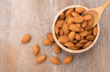 almonds in a wooden bowl