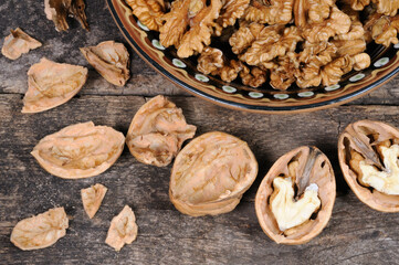 Peeled walnut in a plate. View from above.