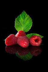 raspberry on green leaf food fruit