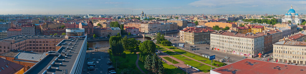 Fototapeta na wymiar Panoramic view of St. Petersburg, the Fontanka river and Trinity Cathedral.