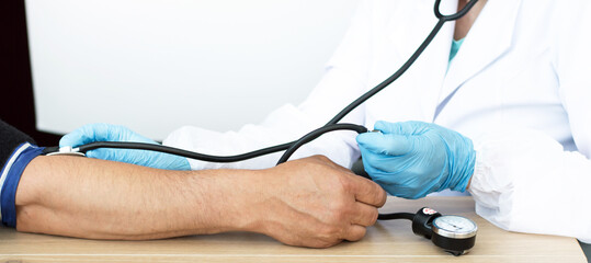 patient at the doctor's office. Measurement of pressure, treatment