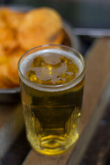 Bad food rest with beer chips and watching football after quarantine