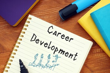 Career concept meaning Career Development with sign on the piece of paper.