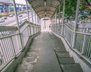 Pedestrian bridge at Pancoran barat Bus Stop in Jakarta.