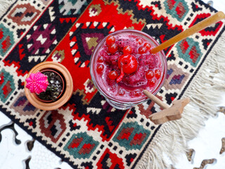 top view of mix berries frappe on colorful table 