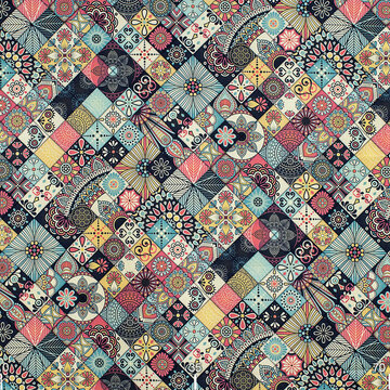 Drawing ornament on colorful patchwork fabric. Fabric with natural texture, Cloth backdrop.