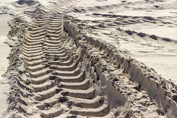 tire track in sandy quarry