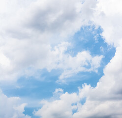 Blue sky with white clouds on a summer sunny day