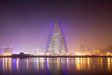 Fototapeta na wymiar The Bahrain skyline during fog with beautiful scattered hue, a view from Bahrain bay