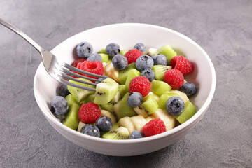 bowl of fruit salad with berries fruits