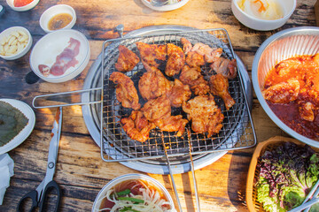 Charcoal grilled chicken with spicy and sweet sauce.