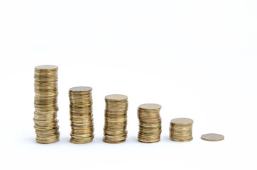 Piles of gold coins stacked in the shape of steps on a white background
