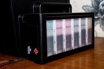Color ink cartridges in an inkjet printer.
