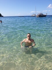 man on a tropical sea in Martinique 